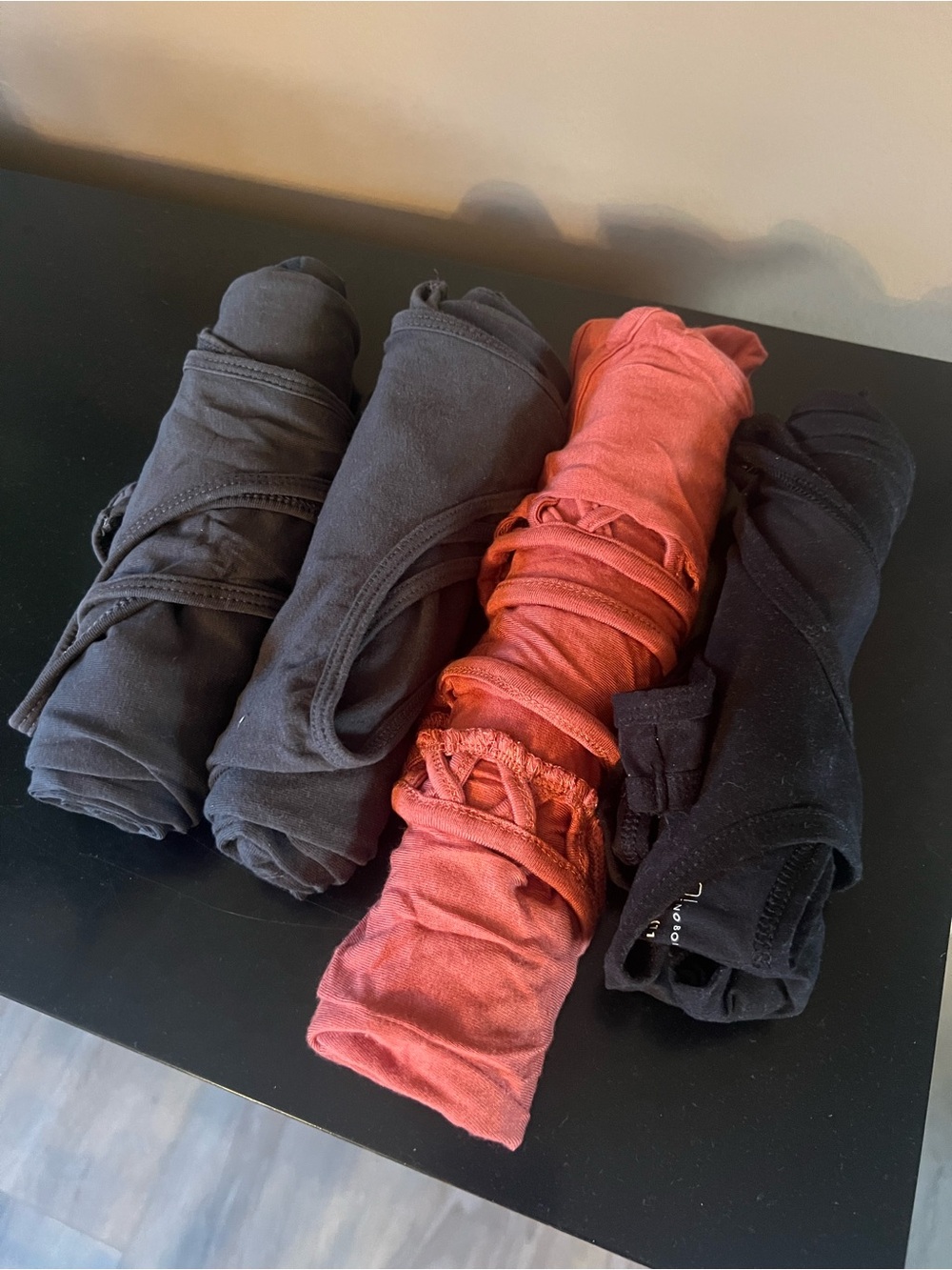 Tank tops group of 4.   Black and Rust